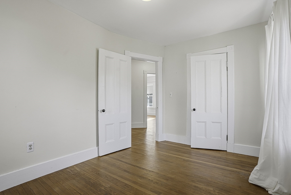 2 Maple Avenue Natick, MA 01760 - Photo 32 of 41 a view of an empty room with wooden floor
