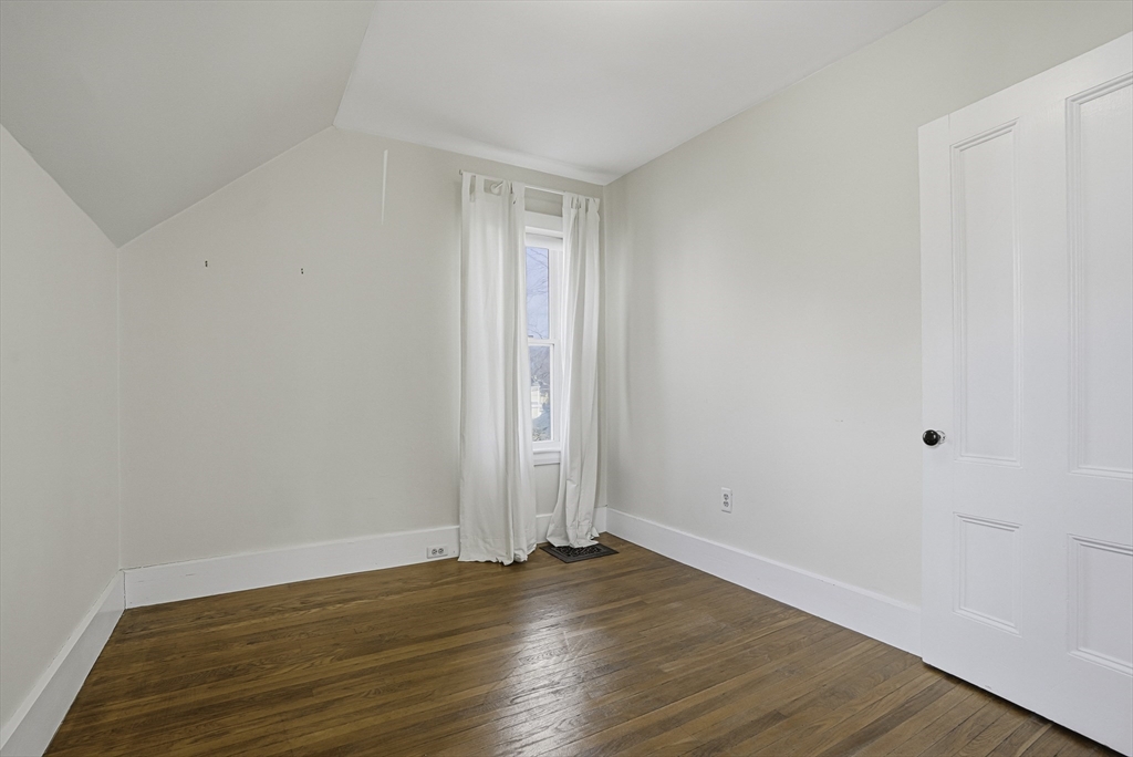 2 Maple Avenue Natick, MA 01760 - Photo 33 of 41 a view of an empty room with wooden floor