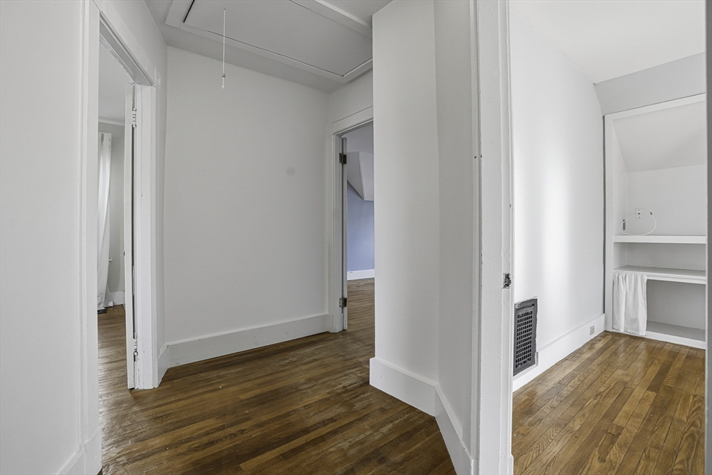 2 Maple Avenue Natick, MA 01760 - Photo 34 of 41 a view of a bedroom with wooden floor and closet