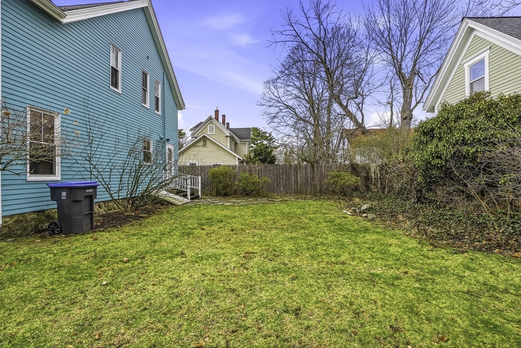 2 Maple Avenue Natick, MA 01760 - Photo 37 of 41 a backyard of a house with table and chairs