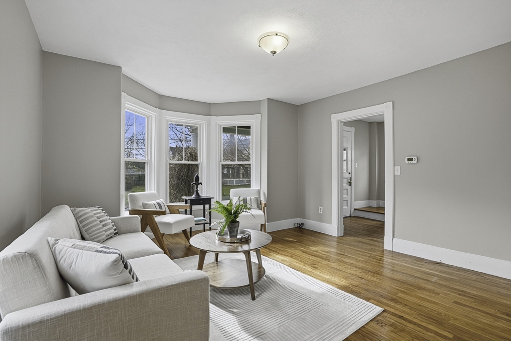 2 Maple Avenue Natick, MA 01760 - Photo 9 of 41 a living room with furniture and a window