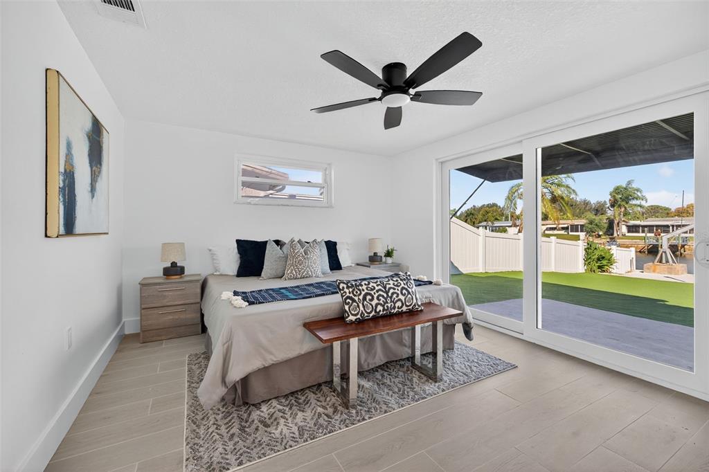 12734 2nd Isle Hudson, FL 34667 - Photo 11 of 22 a living room with furniture and a large window