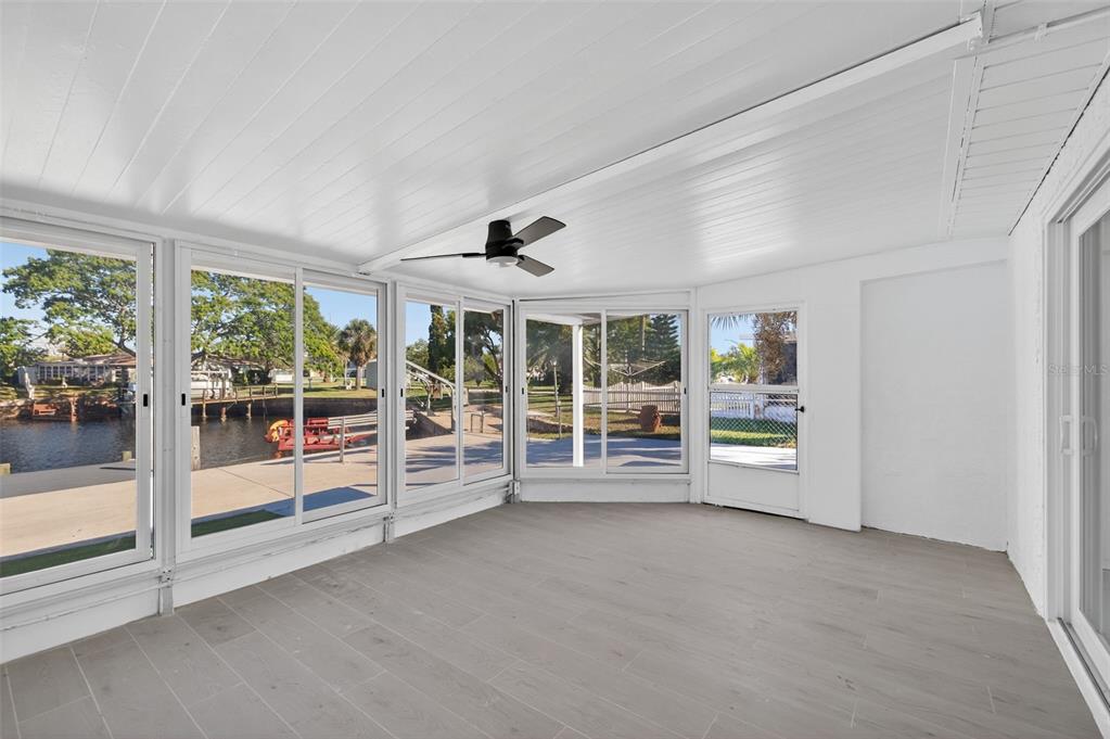 12734 2nd Isle Hudson, FL 34667 - Photo 16 of 22 a view of an empty room with windows