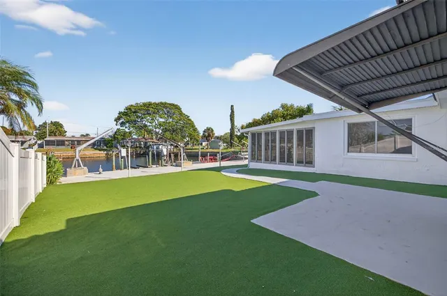 a view of a house with a big yard