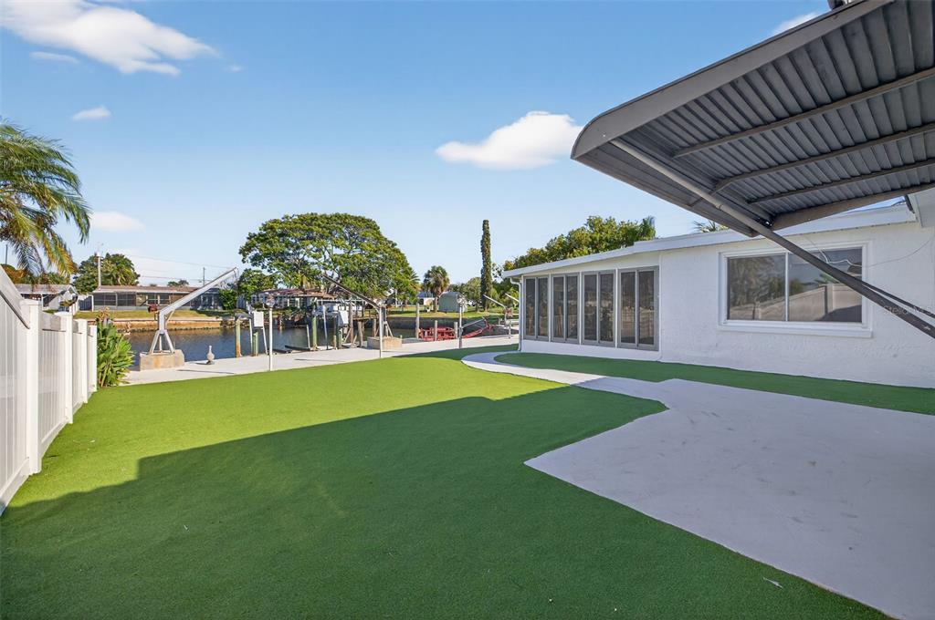 12734 2nd Isle Hudson, FL 34667 - Photo 18 of 22 a view of a house with a big yard