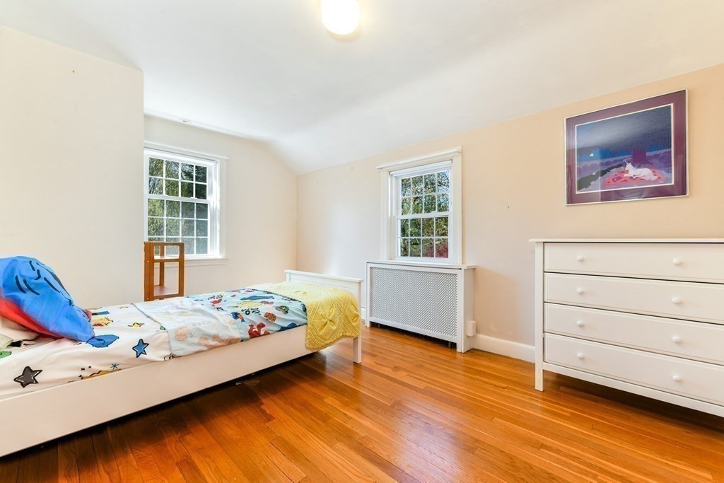 47 White Pine Road Newton, MA 02464 - Photo 15 of 24 a bedroom with a bed and a window