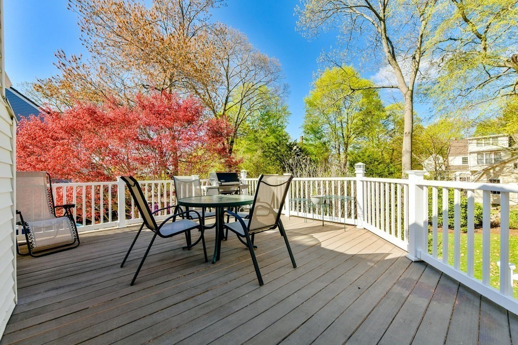 47 White Pine Road Newton, MA 02464 - Photo 19 of 24 a view of a wooden deck with furniture