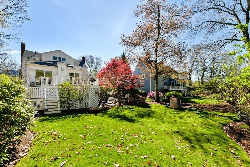 47 White Pine Road Newton, MA 02464 - Photo 20 of 24 a view of a house with a yard