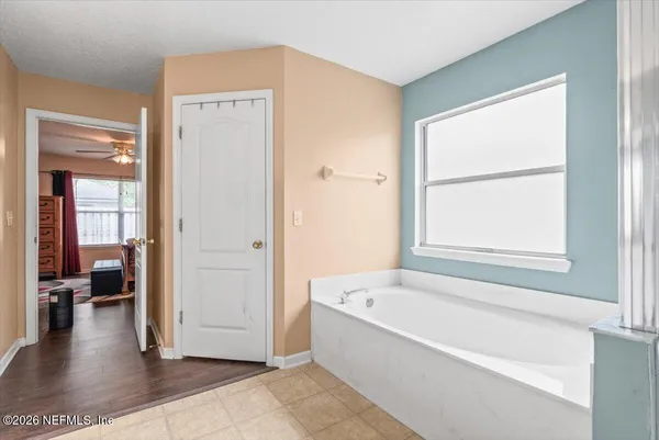 a view of a bathtub in a room