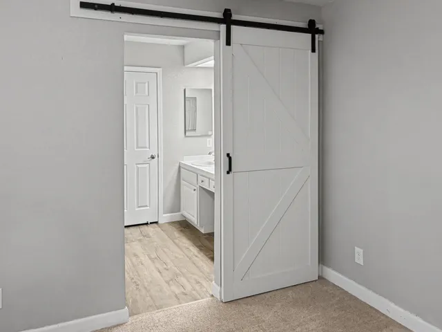 a view of a room that has a window in it