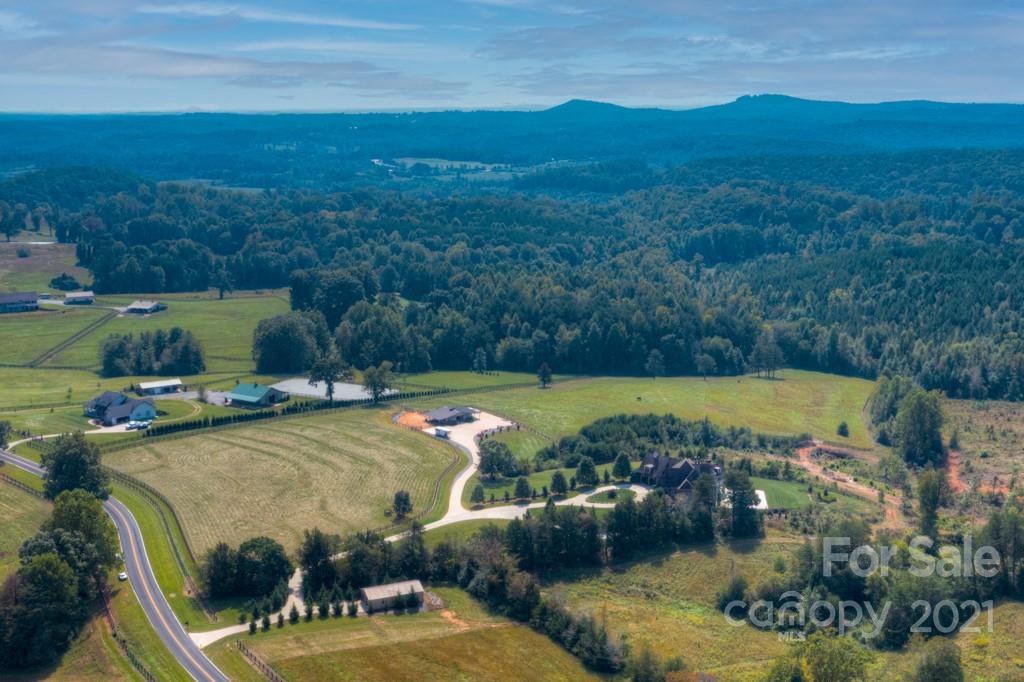 874-a R A R Thompson Road, Unit 24 Mill Spring, NC 28756 - Photo 3 of 47 a view of a swimming pool and mountains
