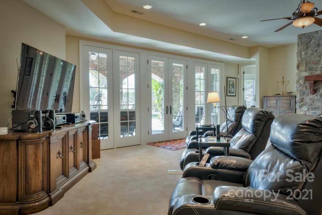 874-a R A R Thompson Road, Unit 24 Mill Spring, NC 28756 - Photo 22 of 47 a living room with furniture and a flat screen tv