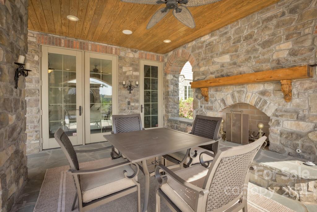 874-a R A R Thompson Road, Unit 24 Mill Spring, NC 28756 - Photo 28 of 47 a view of a balcony with table and chairs