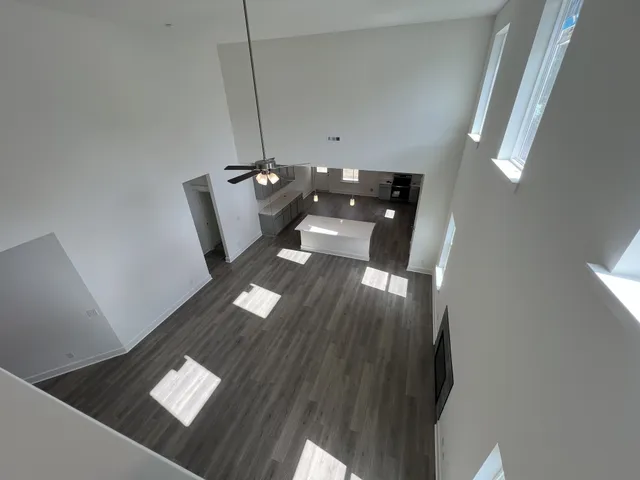 a view of workspace with wooden floor