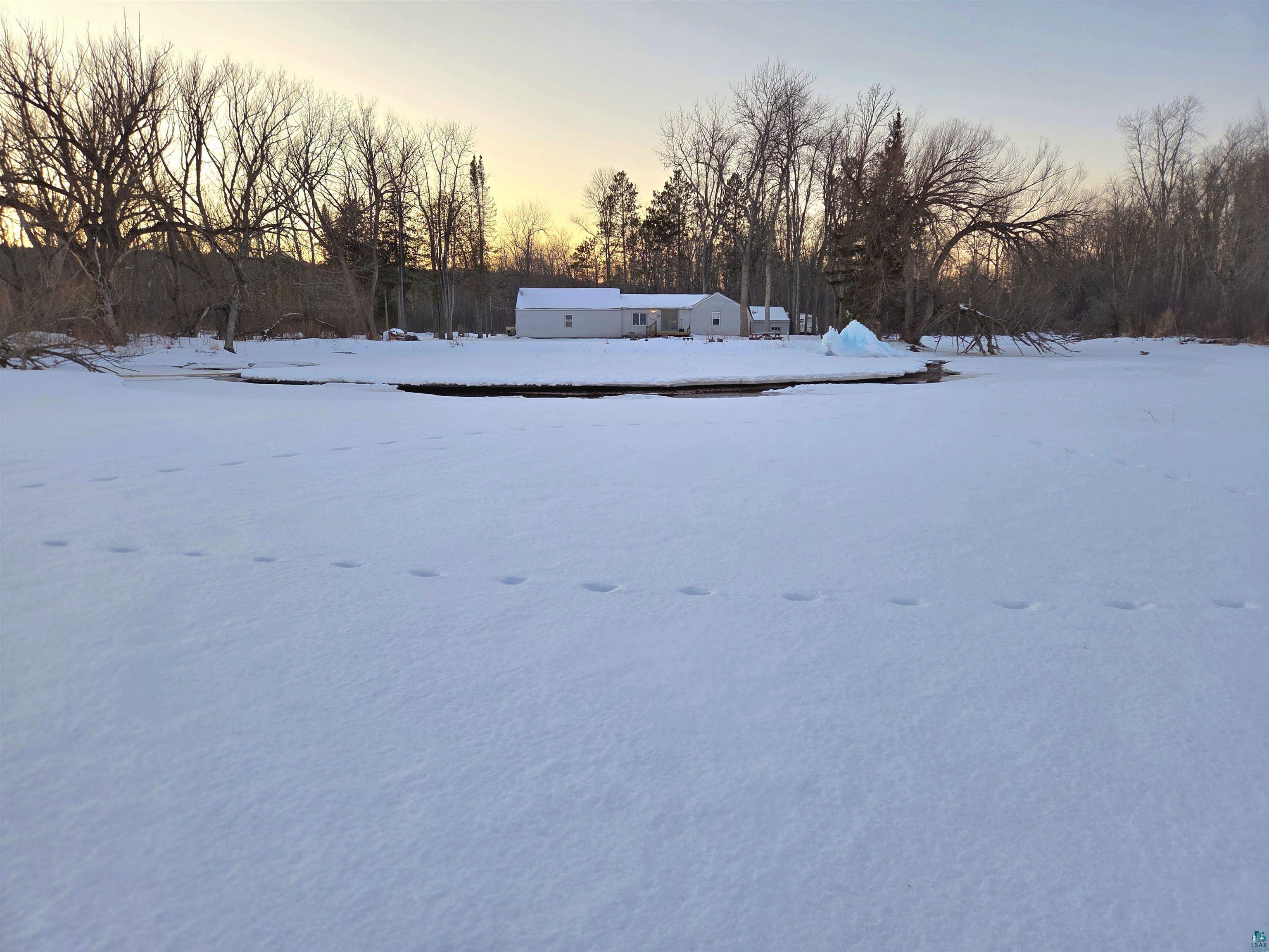 6424 Summit Avenue Washburn, WI 54891 - Photo 52 of 68 Winter View Of Home From Lake