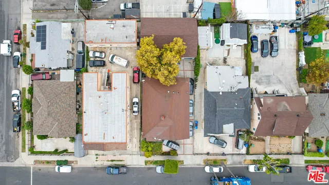 aerial view of residential house with outdoor space