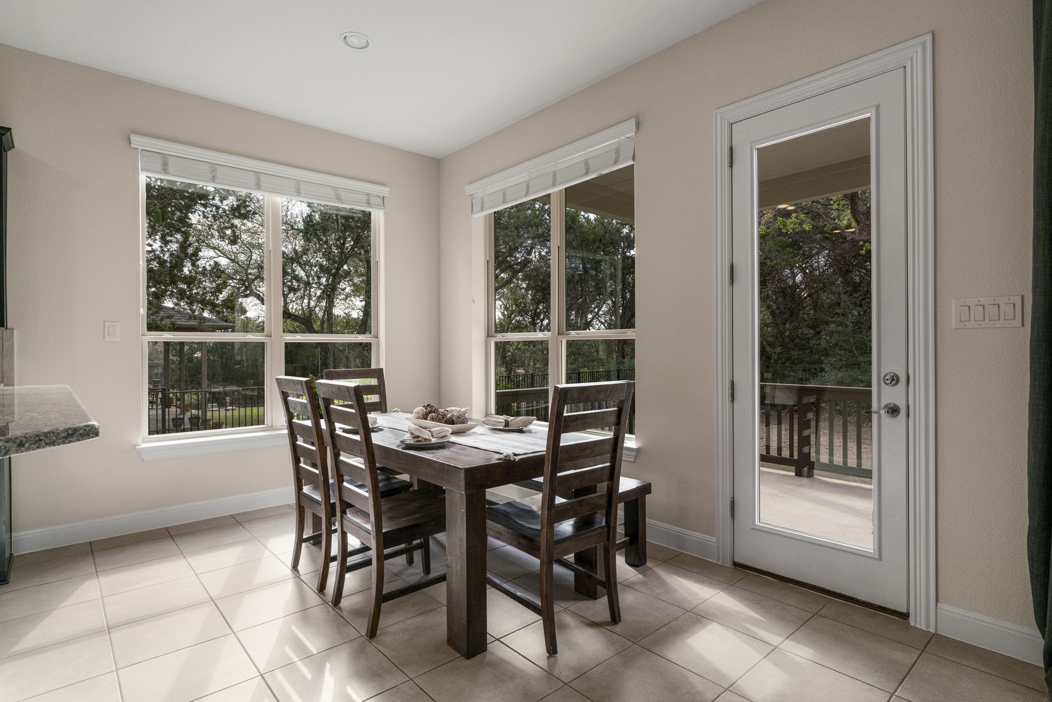 1606 Flint Rock Loop Driftwood, TX 78619 - Photo 13 of 40 Breakfast area is off the kitchen and has tons of natural light.