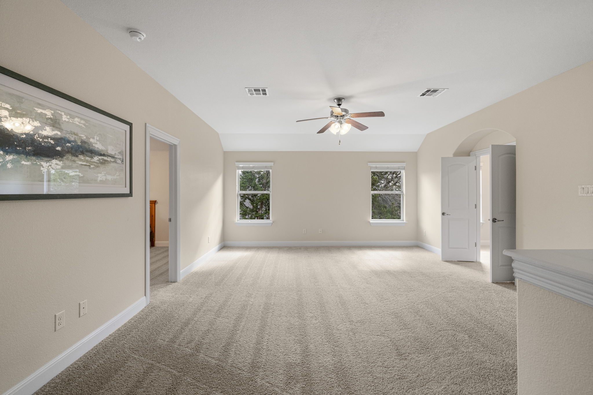 1606 Flint Rock Loop Driftwood, TX 78619 - Photo 23 of 40 As you walk up the stairs you are greeted by this huge game room.