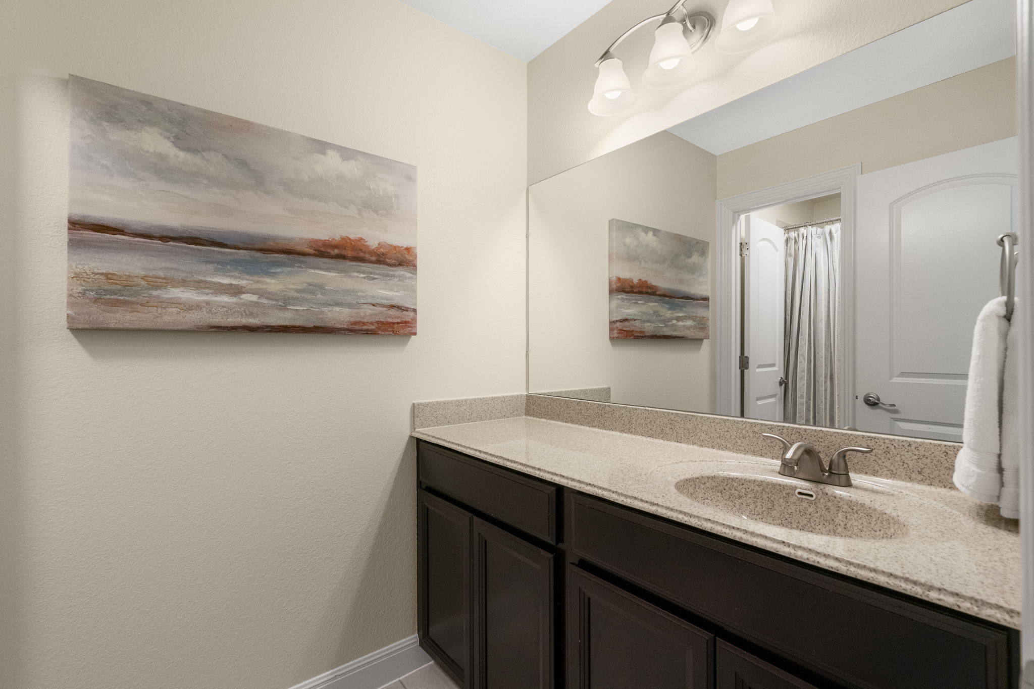 1606 Flint Rock Loop Driftwood, TX 78619 - Photo 25 of 40 This bathroom is located in the hallway upstairs for Bedrooms #3 and #4