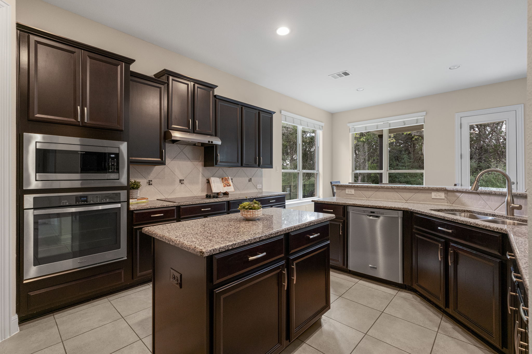 1606 Flint Rock Loop Driftwood, TX 78619 - Photo 10 of 40 Kitchen is a perfect size for a whole family cooking or entertaining friends.
