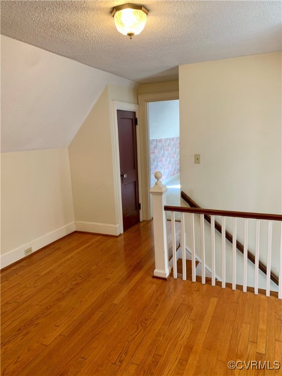 3237 Huntington Trail Cascade, VA 24069 - Photo 30 of 30 Bonus room with lofted ceiling, light hardwood / w