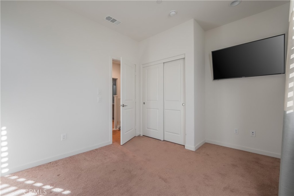 9513 Retreat Place Rancho Cucamonga, CA 91730 - Photo 28 of 49 a view of a livingroom with an empty space