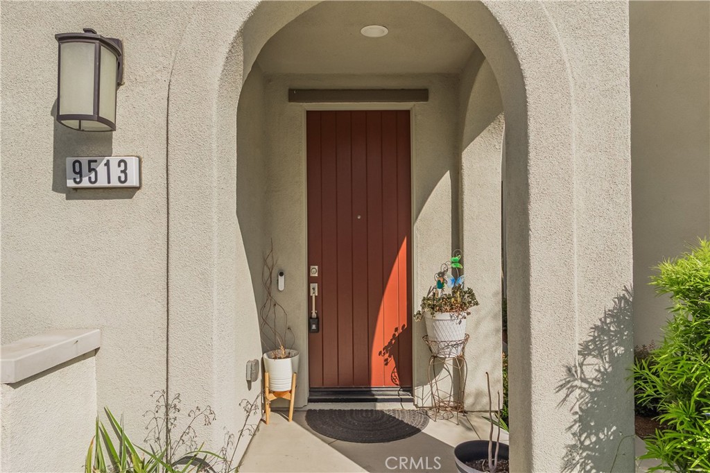 9513 Retreat Place Rancho Cucamonga, CA 91730 - Photo 4 of 49 a view of an entryway with wooden floor