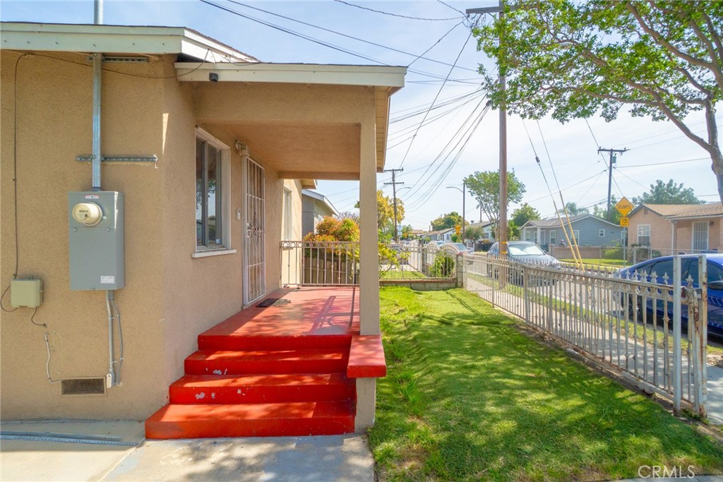 3561 Beck Avenue Bell, CA 90201 - Photo 2 of 11 a front view of a house having yard