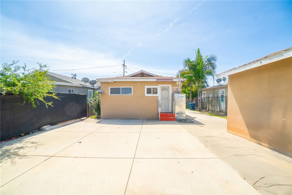 3561 Beck Avenue Bell, CA 90201 - Photo 6 of 11 a front view of a house with a garage