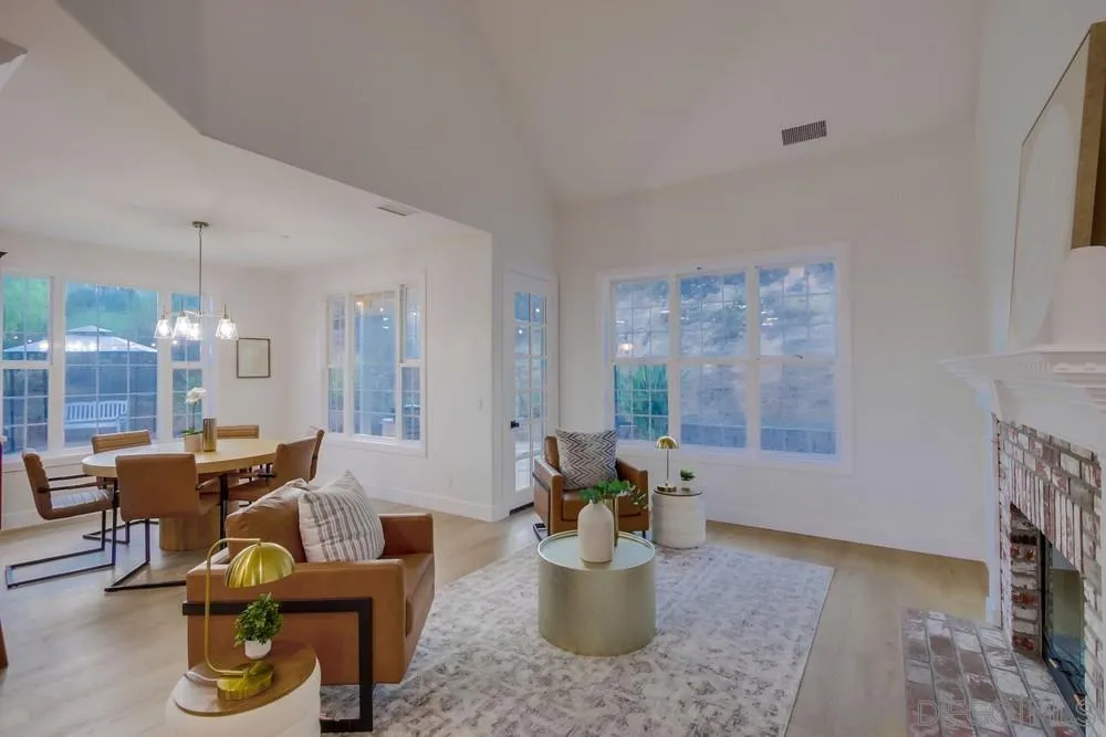 2543 Daisy Lane Fallbrook, CA 92028 - Photo 14 of 74 a dining room with furniture a window and a fireplace