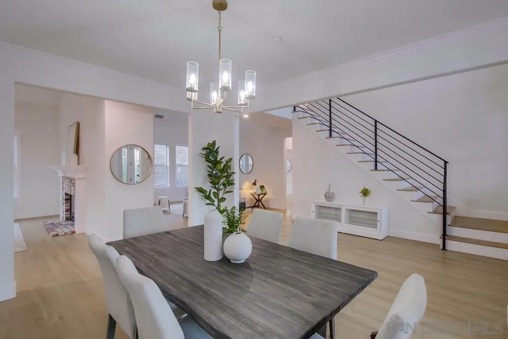 2543 Daisy Lane Fallbrook, CA 92028 - Photo 19 of 74 a dining room with furniture potted plants and wooden floor