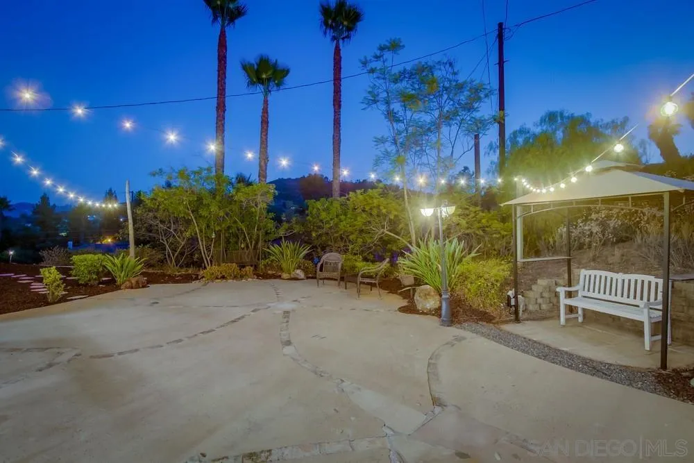 2543 Daisy Lane Fallbrook, CA 92028 - Photo 30 of 74 a view of a chair and tables in the patio