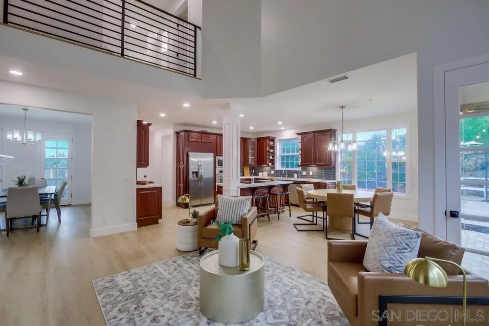 2543 Daisy Lane Fallbrook, CA 92028 - Photo 3 of 74 a living room with furniture and a dining table with wooden floor