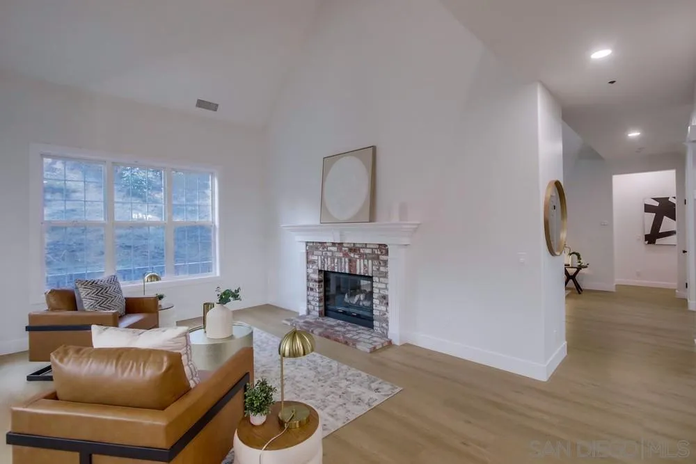 2543 Daisy Lane Fallbrook, CA 92028 - Photo 36 of 74 a living room with furniture and a fireplace