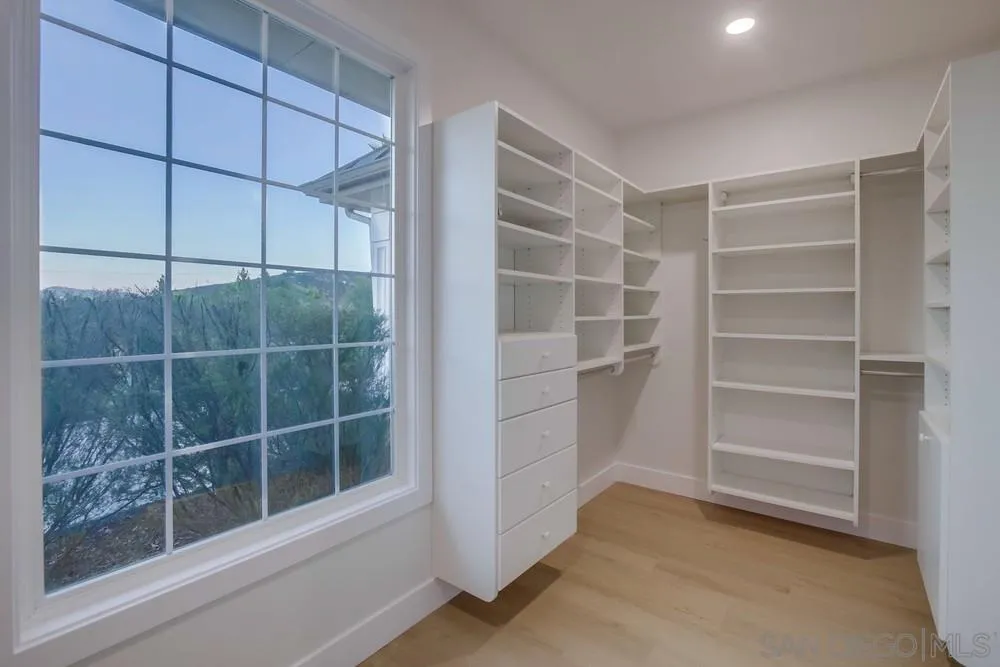 2543 Daisy Lane Fallbrook, CA 92028 - Photo 46 of 74 a view of an empty room with a empty shelves
