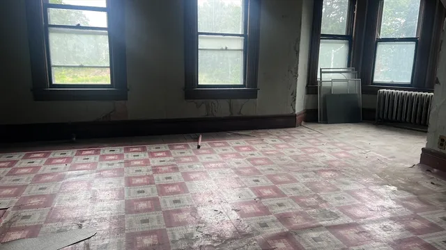 a view of an empty room and window