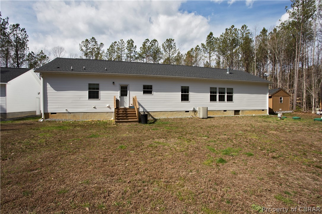 1496 Elsom Mascot Road Mattaponi, VA 23110 - Photo 32 of 33 a house view with a backyard space