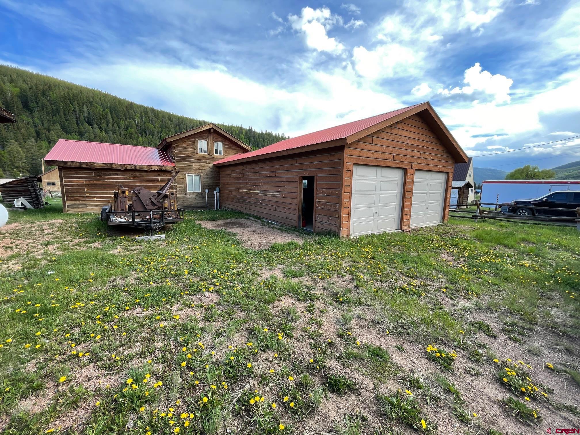 417 State Street Pitkin, CO 81241 - Photo 22 of 23 a house view with a garden space