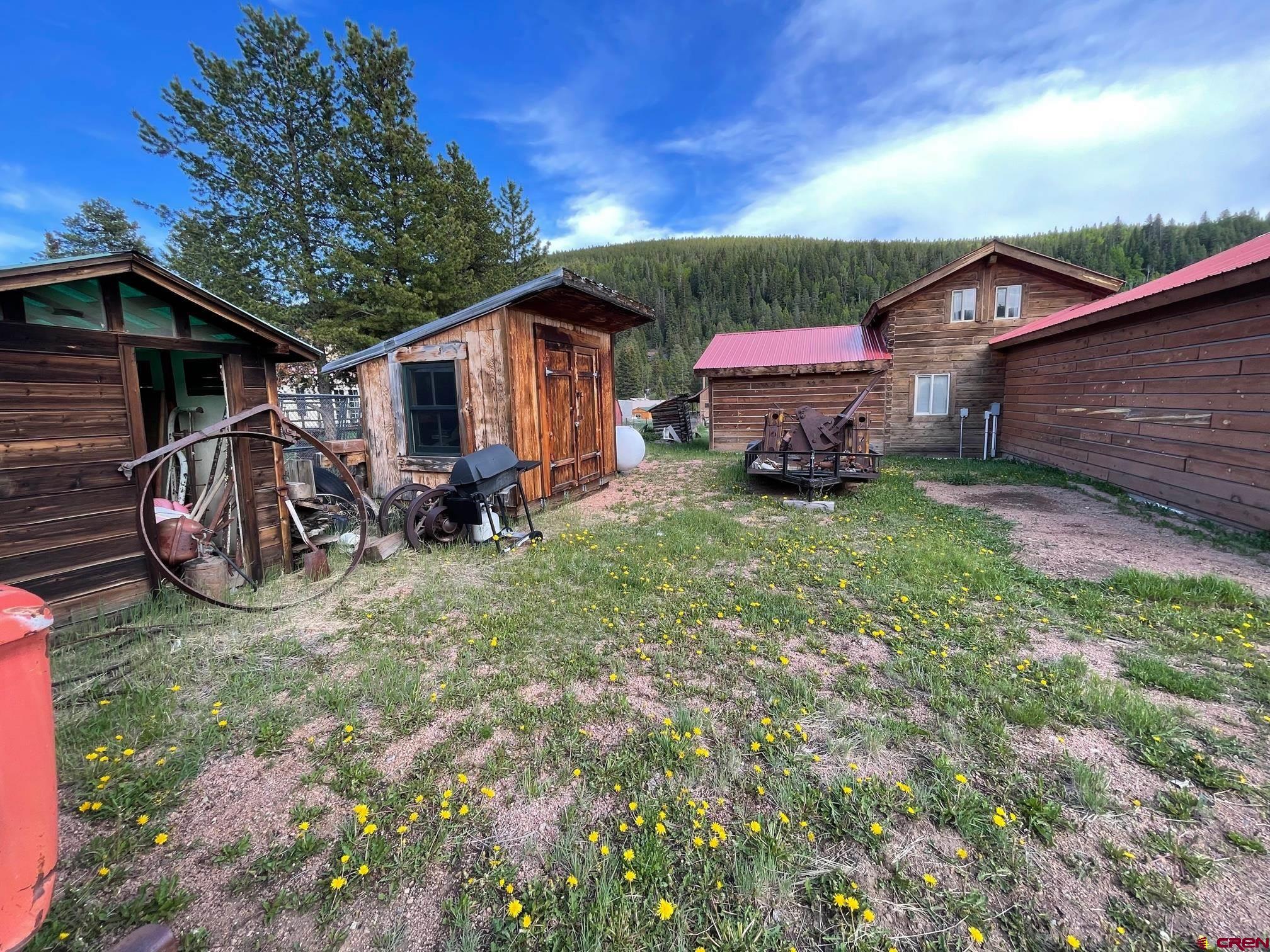 417 State Street Pitkin, CO 81241 - Photo 23 of 23 a view of a house with a yard