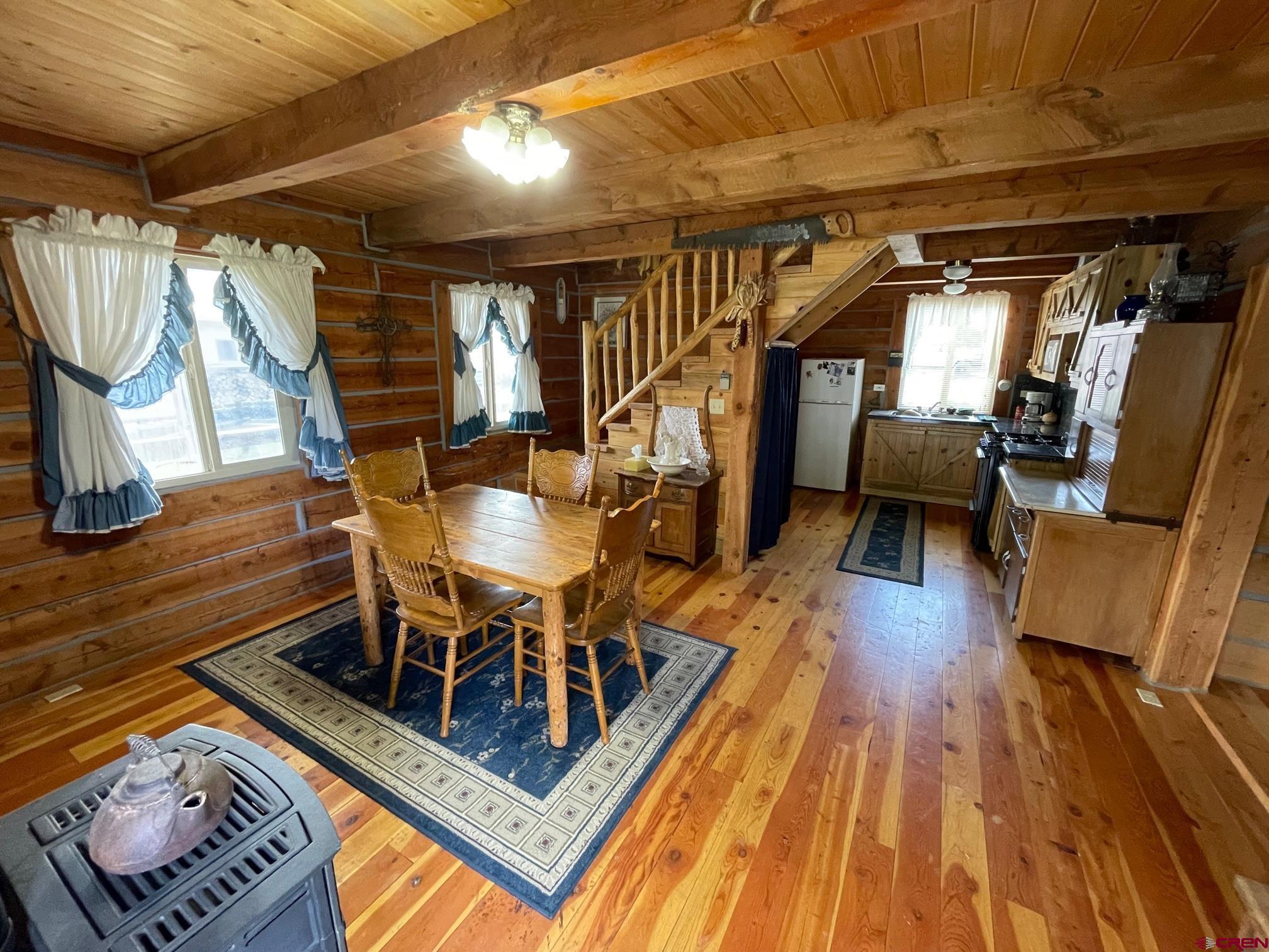 417 State Street Pitkin, CO 81241 - Photo 4 of 23 a view of a chairs and table in a patio