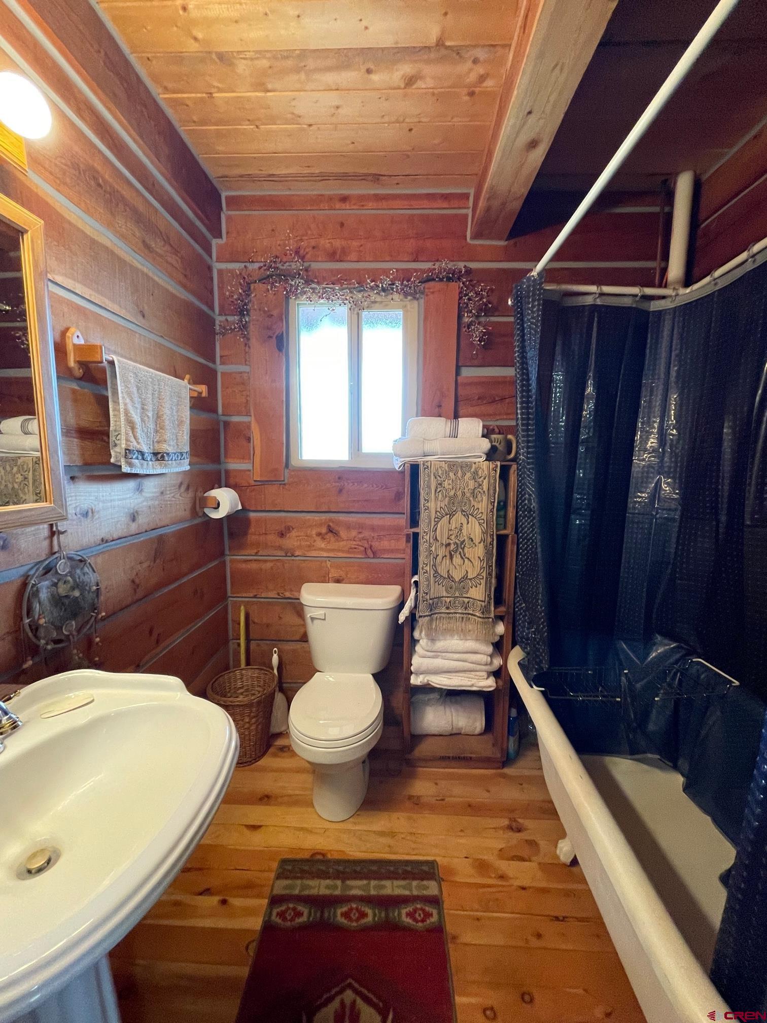 417 State Street Pitkin, CO 81241 - Photo 7 of 23 a bathroom with a sink and a mirror