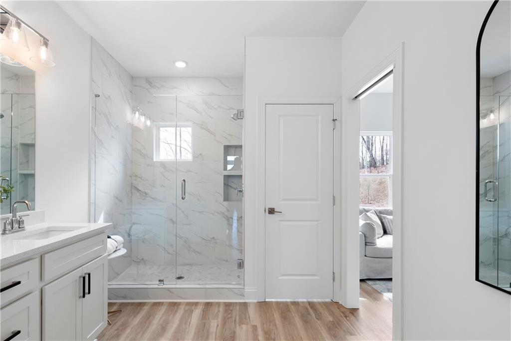 116 Waterview Court Waleska, GA 30183 - Photo 11 of 37 a bathroom with a shower and a sink