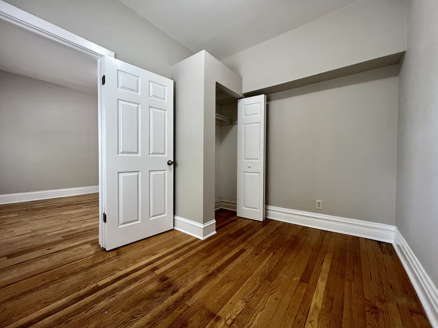 2203 South Ridgeway Avenue Chicago, IL 60623 - Photo 5 of 9 a view of empty room with wooden floor
