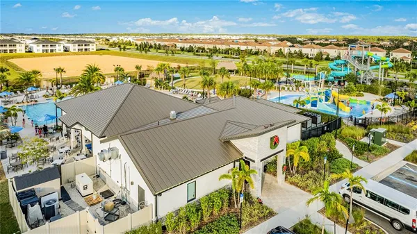 a view of a swimming pool with an outdoor space and seating area