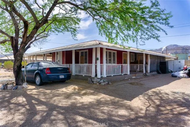 a house view with a garden space