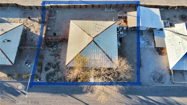 an aerial view of residential house with wooden stairs