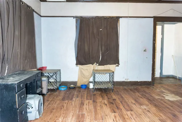 a view of a sink and wooden floor
