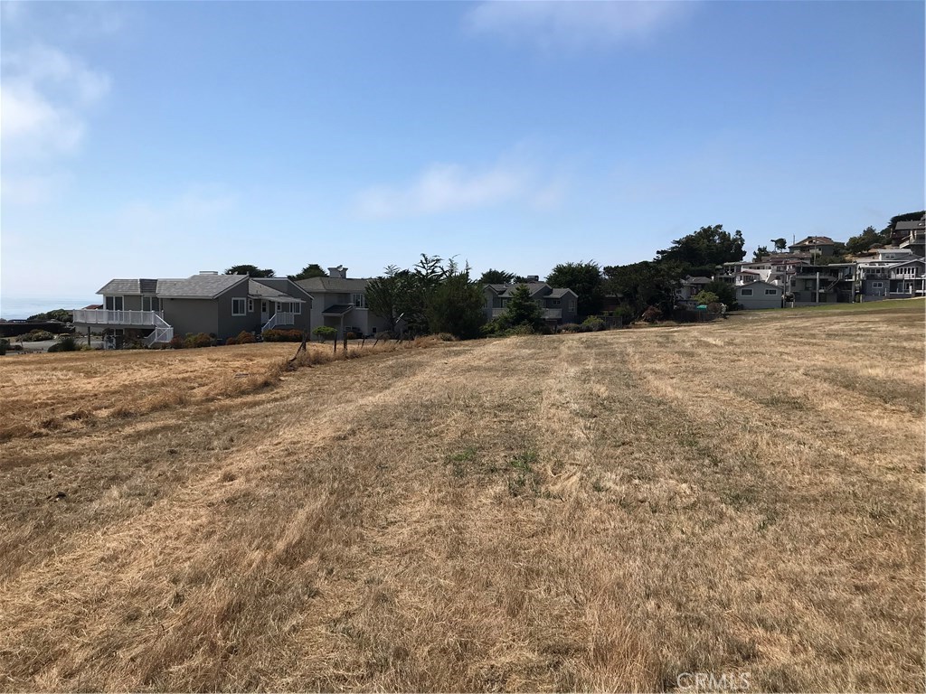 4850 Windsor Boulevard Cambria, CA 93428 - Photo 12 of 23 a view of a field with trees in the background