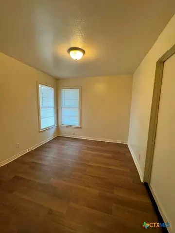 a kitchen with a stove and a microwave