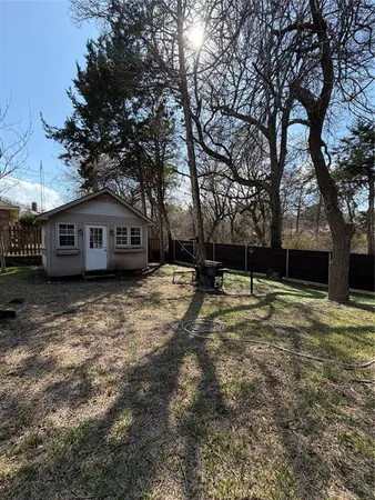 a house with trees in front of it